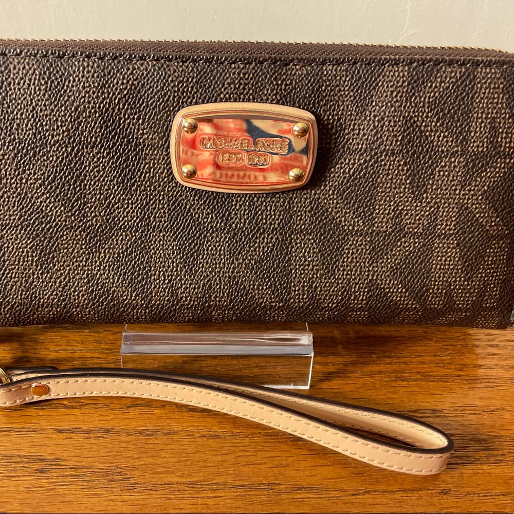 Michael Kors MK signature large zip around wristlet wallet. Gently used.